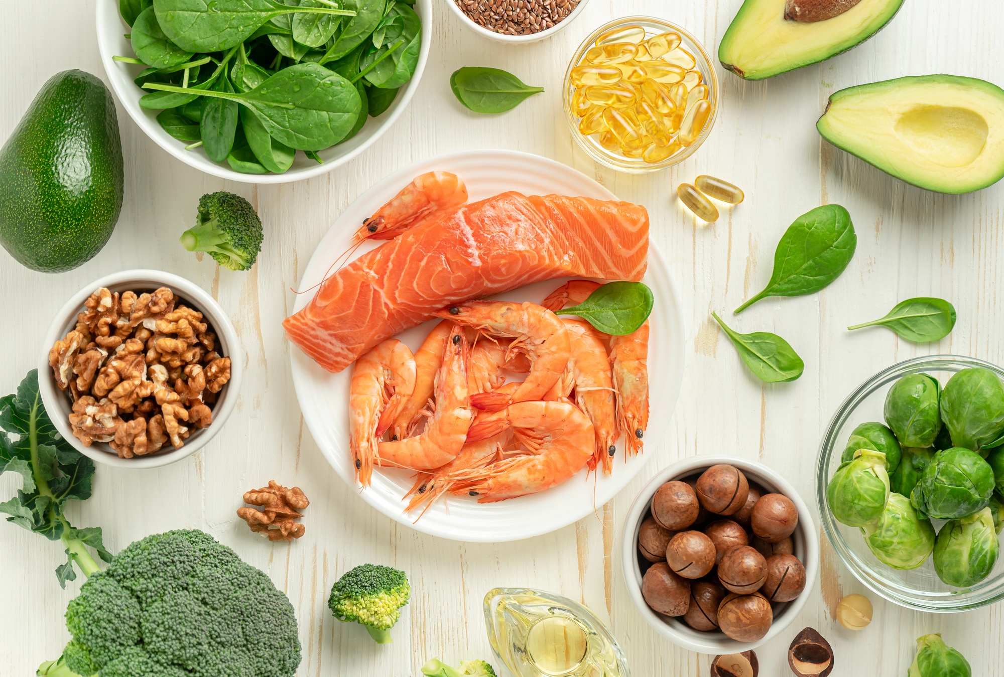Healthy foods selection on white wooden background. Top view, flat lay